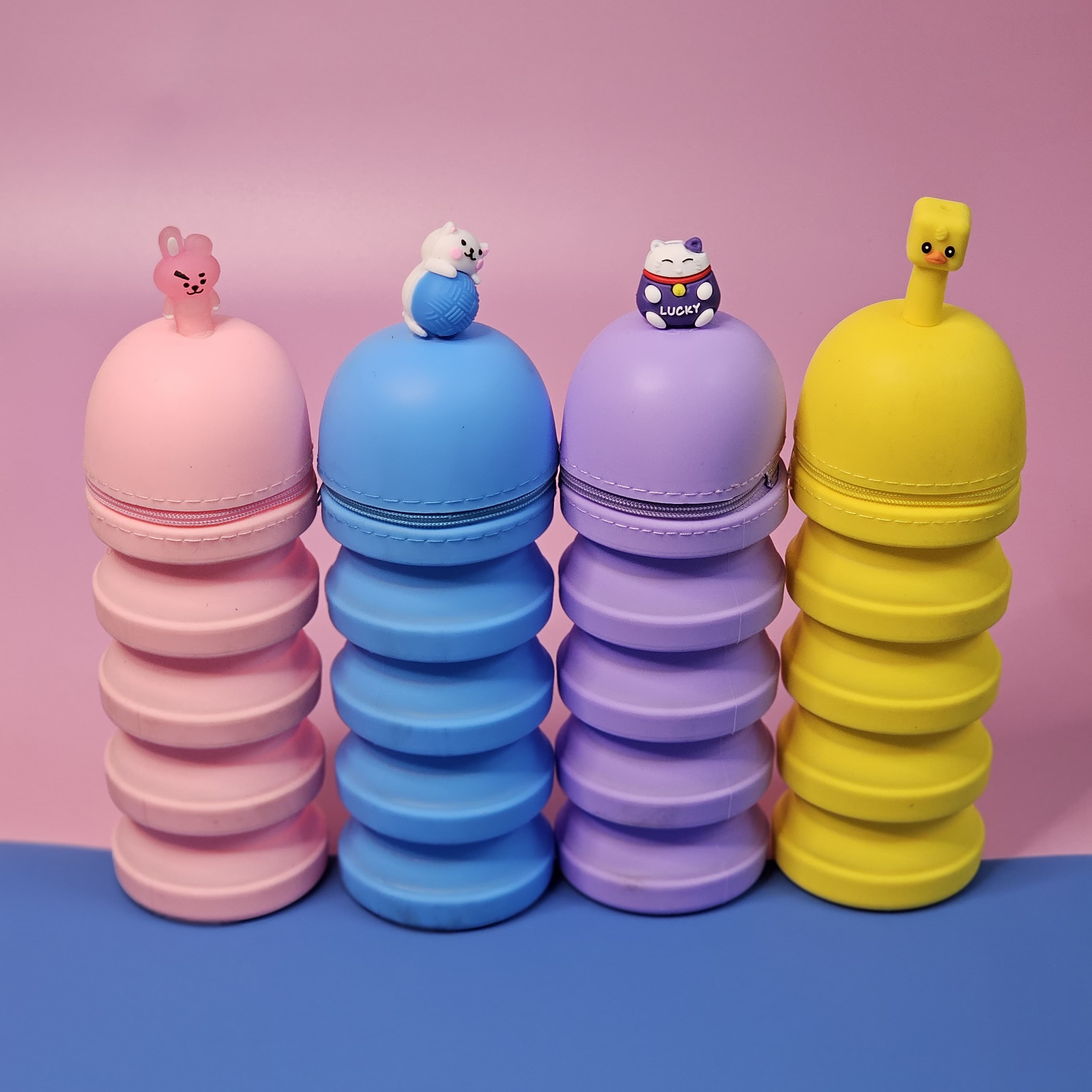 Silicone pencil cases with adorable cartoon toppers – ideal for school, return gifts, and stationery storage